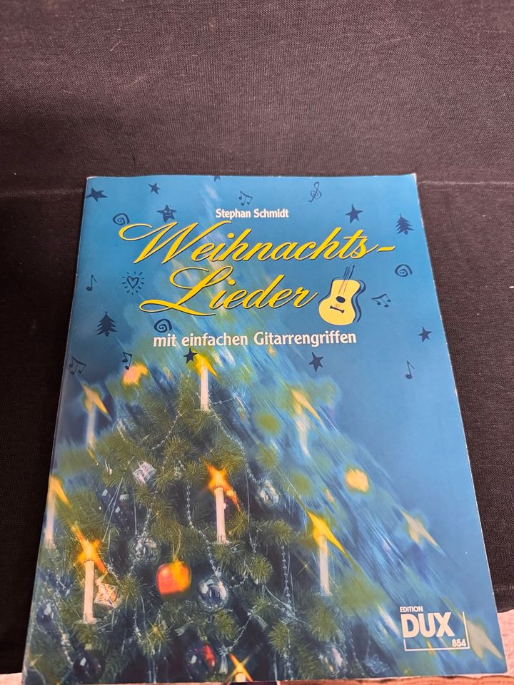 Weihnachtslieder mit einfachen Gitarrengriffen 978-3-934958-17-3